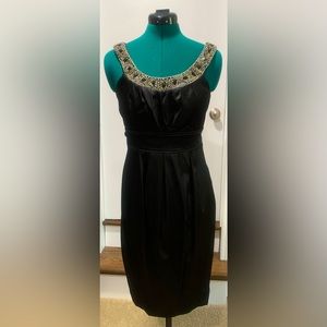 David’s Bridal dress with embellished neckline. Detail tie waist. Size 8